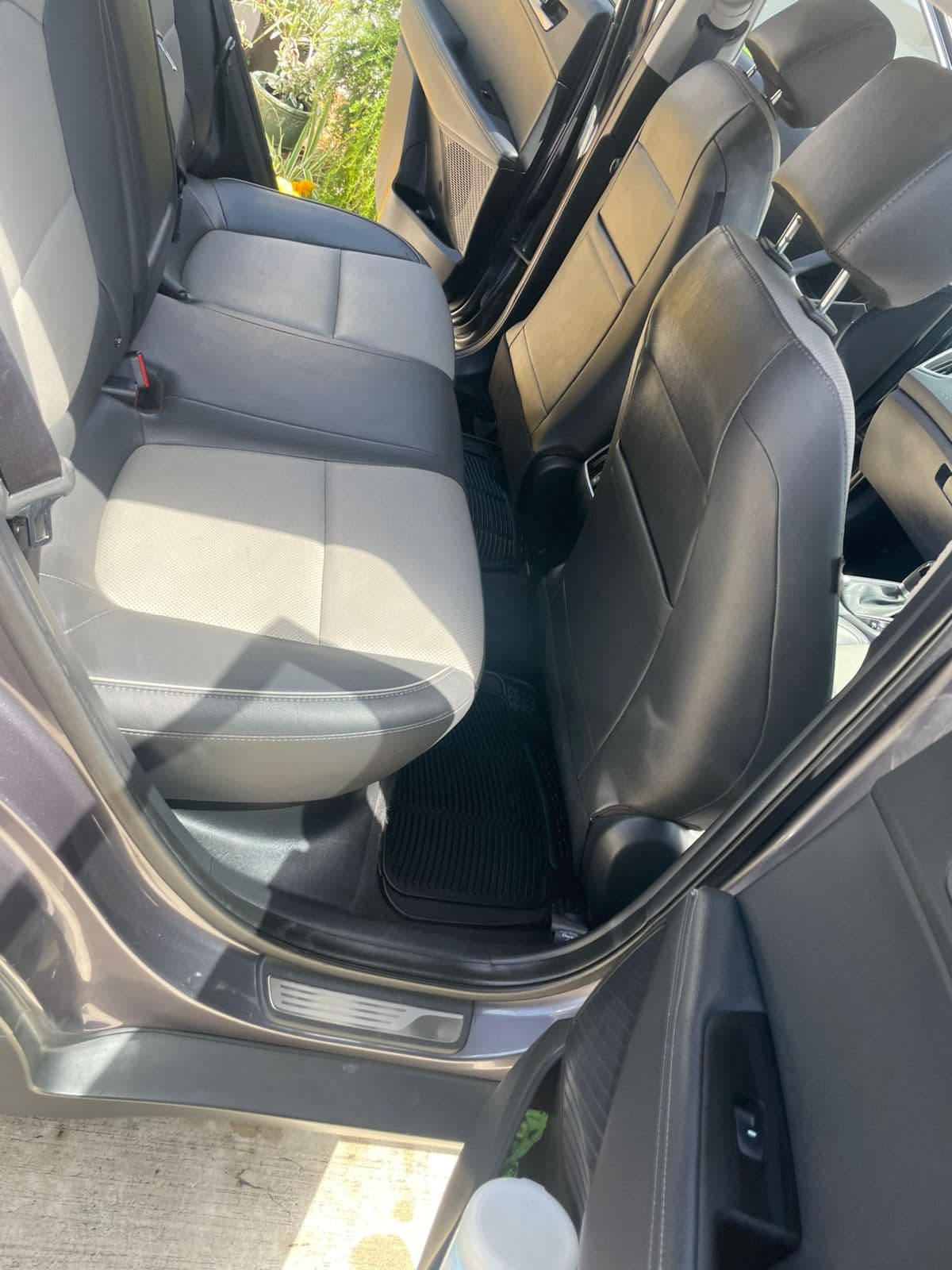 Car back-seat footwells and mats — after cleaning