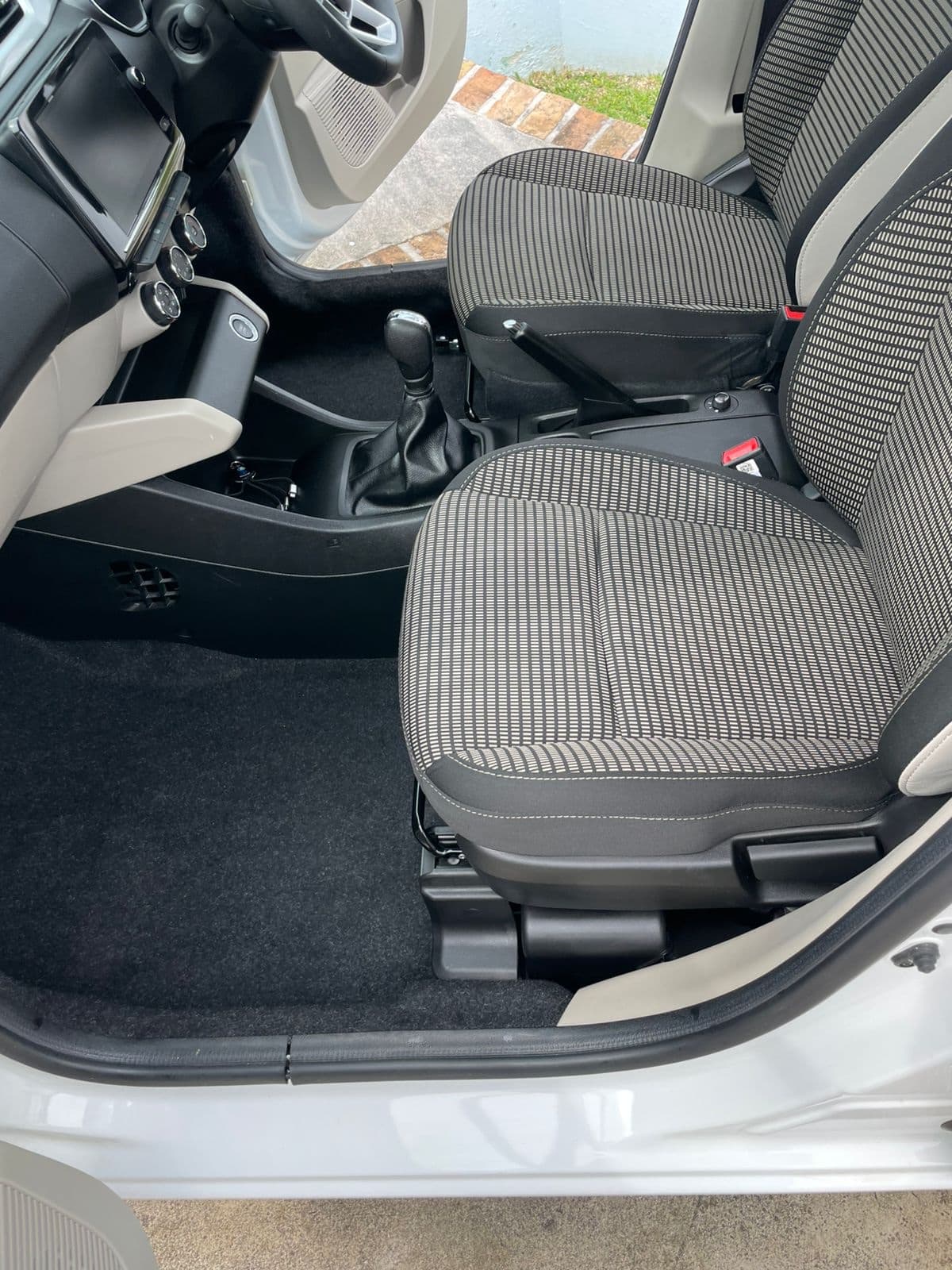 Clean front seats, carpet and console after an interior detail