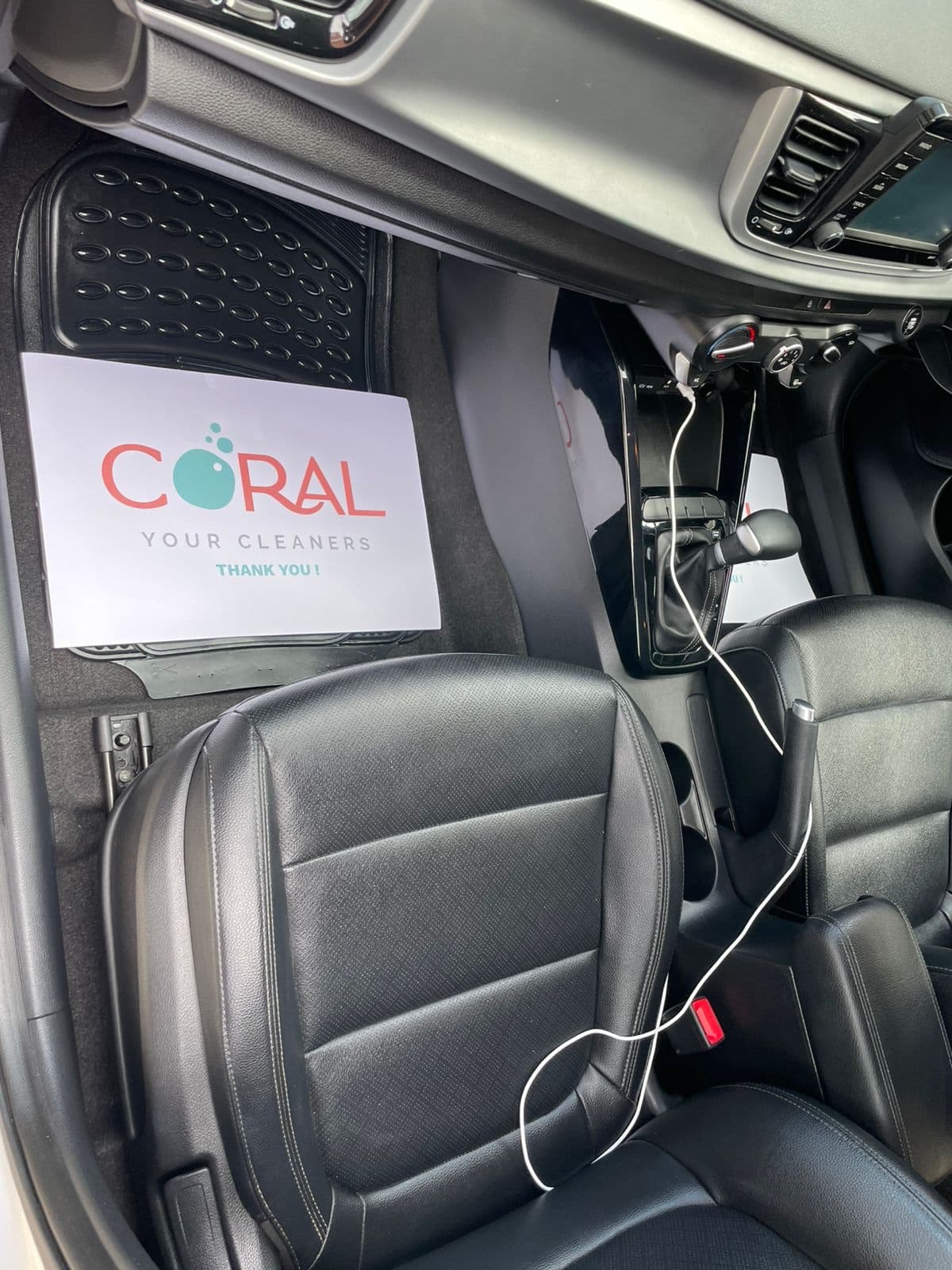 Leather seats cleaned and dressed, with Coral Cleaners thank-you sheets